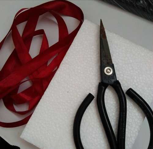 禮帶的結(jié)怎么打,包裝盒絲帶蝴蝶結(jié)的打法圖4