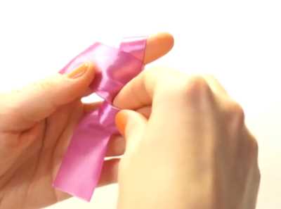 蝴蝶結(jié)怎么打的,怎么打蝴蝶結(jié)簡單方法圖3