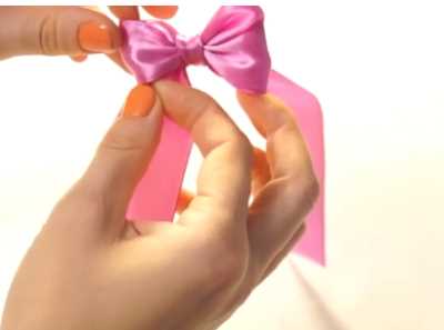 蝴蝶結(jié)怎么打的,怎么打蝴蝶結(jié)簡單方法圖5